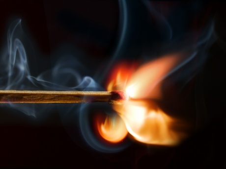 burning match signifying on fire
