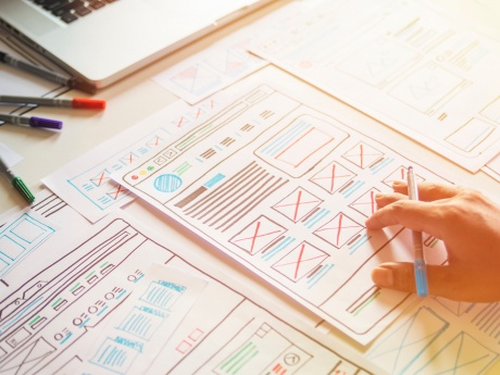 ux ui design diagrams with hands